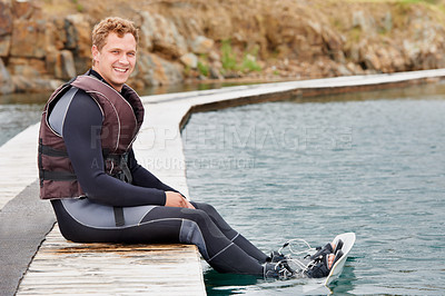 Buy stock photo Sports, lake and portrait of man with wakeboard for surfing, exercise and recreation hobby outdoors. Fitness, extreme sport and person with board for water skiing for freedom, adventure and fun