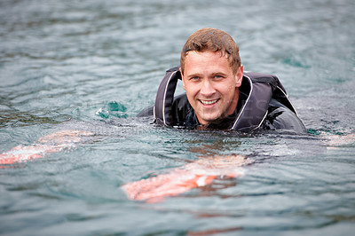 Buy stock photo Man, water ski and portrait in lake, happy and waiting for tow with fitness, extreme sports or exercise. Person, smile and outdoor in river, nature and float with swimming, health and summer training