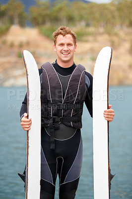 Buy stock photo Lake, ski and portrait of man with wakeboard for surfing, exercise and recreation hobby outdoors. Fitness, extreme sports and happy person with board for water skiing for freedom, adventure and fun