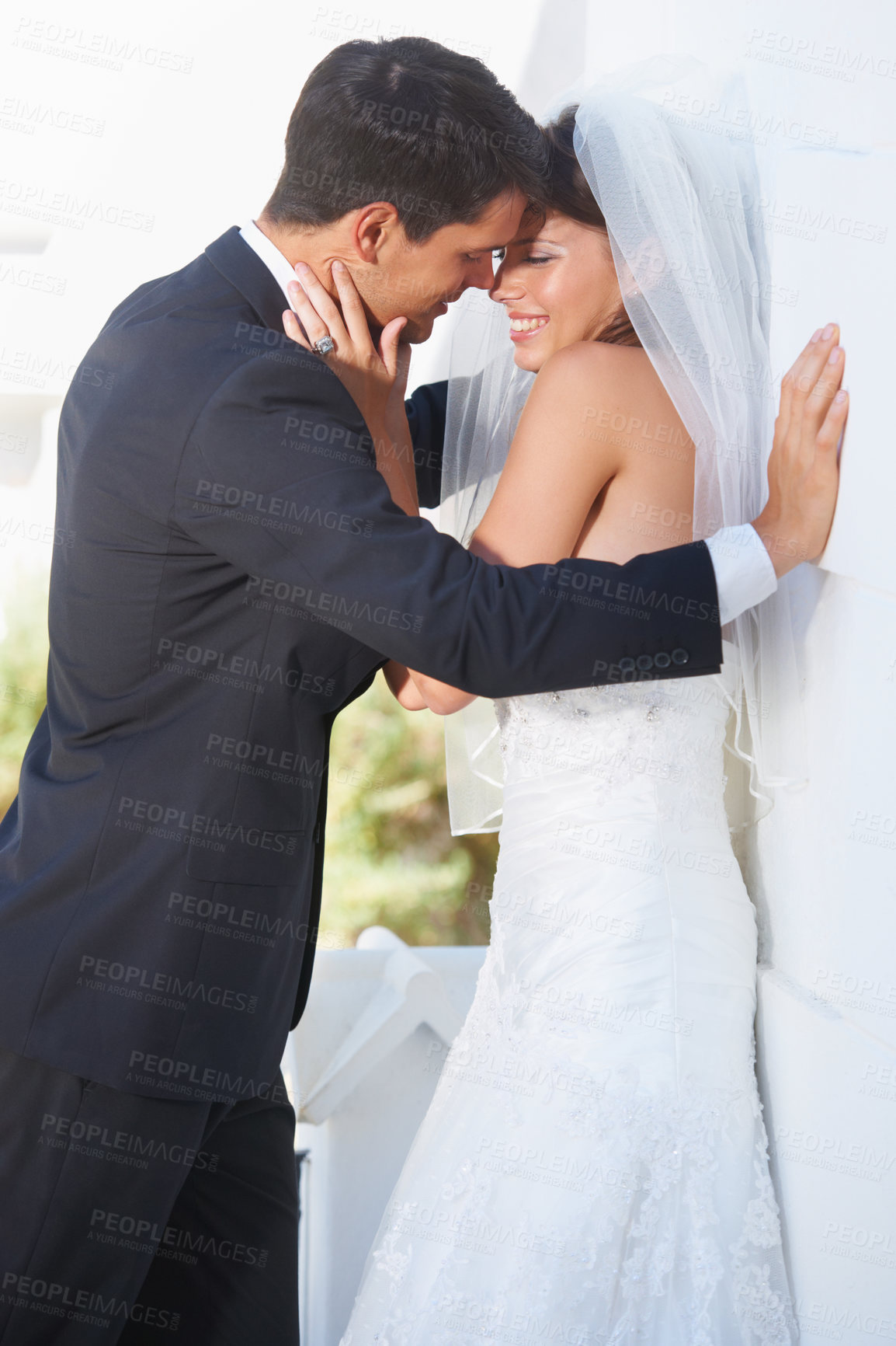 Buy stock photo Hug, wedding and bride with groom outdoor for love, care and excited for life event, union or trust. Love, happy and couple outside for marriage ceremony with support, security and excited for future