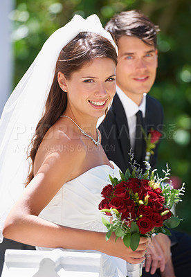 Buy stock photo Wedding, portrait and bride and groom with flowers for love, celebration or union, ceremony or romance. Commitment, marriage and face of couple outside with support, trust and security or life event