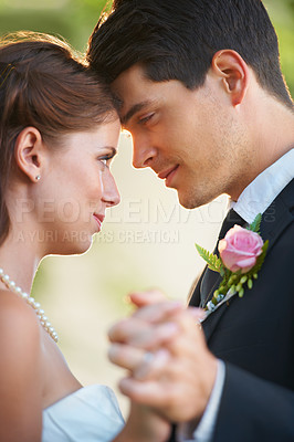 Buy stock photo Wedding, dance and bride and groom holding hands with love, trust and solitude, security and respect. Marriage, commitment and couple together and ceremony for romantic, celebration or gratitude