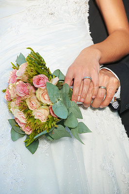 Buy stock photo Couple, wedding ring and hands on rose bouquet in marriage with bride at celebration and event. Flower, loyalty and care with romance with love and commitment with woman and man and floral plant