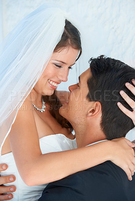 Buy stock photo Love, woman and man embrace at wedding with smile, support and commitment for couple at reception. Romance, bride and groom hugging at marriage celebration with happiness, loyalty and future together