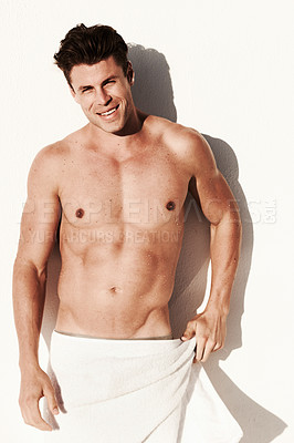 Buy stock photo Muscle, body and sexy portrait of a man in a towel while happy, handsome and clean. Strong, fitness and young male model posing shirtless with smile, beauty and motivation or inspiration after shower
