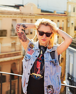 Buy stock photo Tattoo, portrait and woman with sunglasses in city, urban body art or stylish fashion outdoor. Face, rooftop or trendy female person from Canada in cool denim clothes, jacket or serious punk attitude