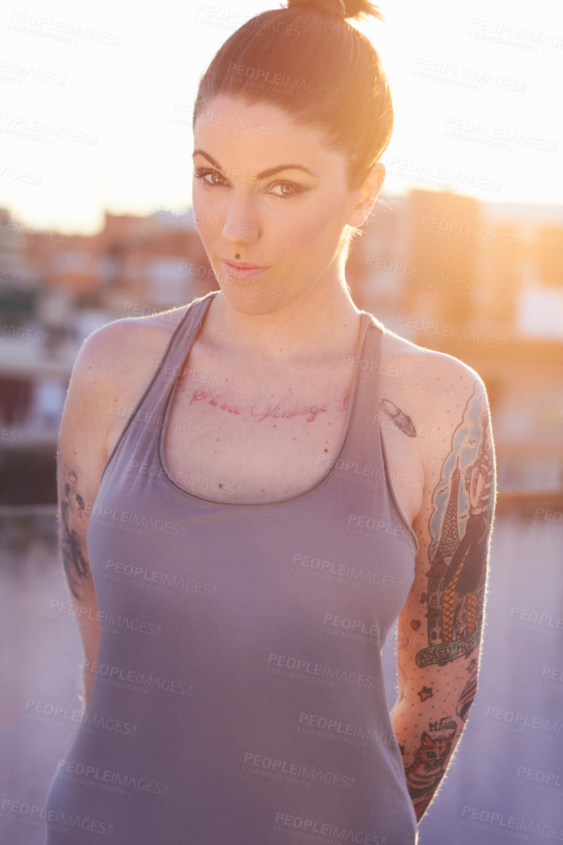 Buy stock photo Tattoo, portrait and fashion woman in city with urban body art or stylish aesthetic. Face, street or trendy female person from Canada in cool clothes, attitude or punk individuality outdoor at sunset