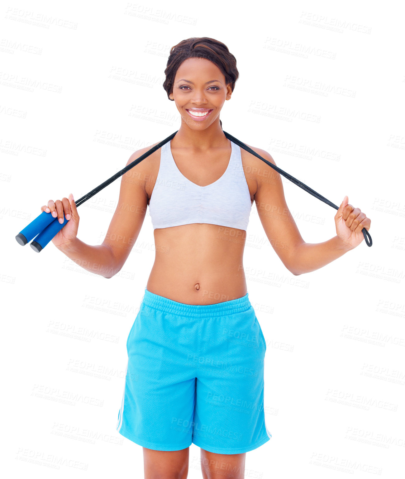 Buy stock photo Pretty young african american woman holding a skipping rope around her neck against a white background