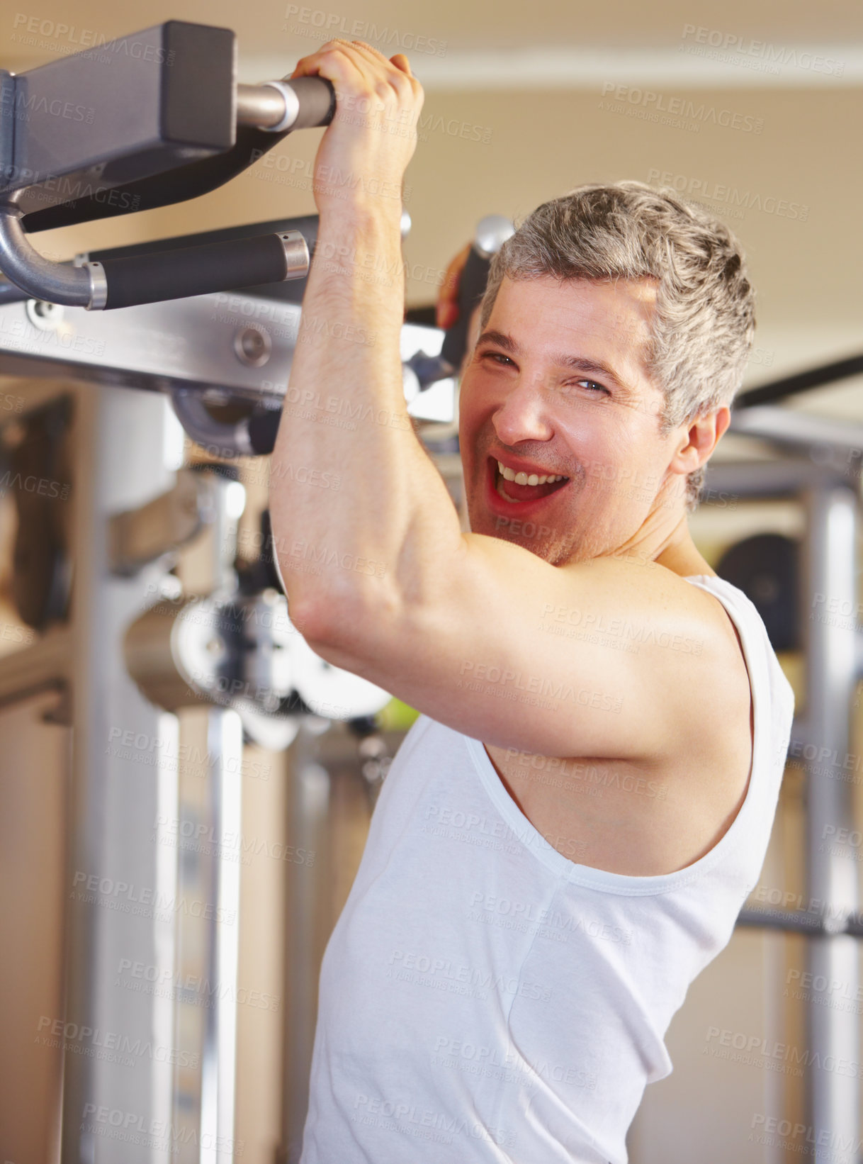 Buy stock photo Portrait of an excited man working out at the gym