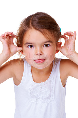 Buy stock photo Portrait, children and having fun with a girl child in studio isolated on a white background for comedy. Comic, funny face or mock and an adorable young kid sticking her thumbs in her ears for humor