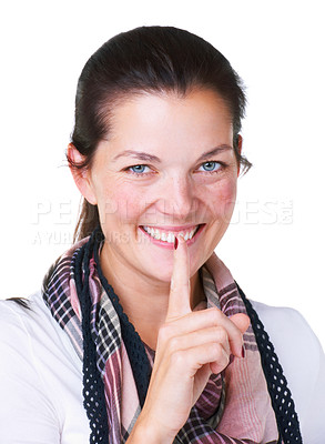 Buy stock photo Portrait of an attractive young woman with her finger on her lips