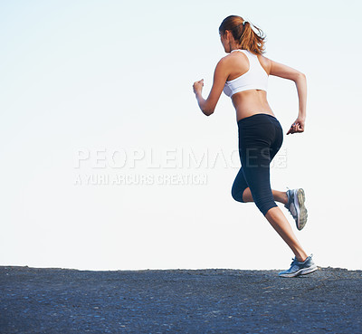 Buy stock photo Woman, running and mockup for exercise and fitness outdoor with space, asphalt and training for marathon. Runner, workout and back of athlete on road with sky, health and wellness from cardio