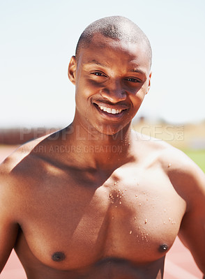 Buy stock photo Fitness, portrait and happy man runner at a race track for health, exercise and cardio routine. Smile, face and topless African male athlete at a stadium for performance, challenge and training run