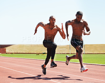 Buy stock photo Man, athlete and running on track for race, practice or training for competition. Black people, together and competitive with dedication, motivation and determination for sport, health and fitness