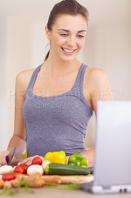 Buy stock photo Woman, tablet and smile with knife or vegetables for nutrition, cooking recipe or healthy meal in kitchen of home. Person, face and technology with mushroom, peppers and carrots for wellness and diet