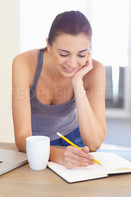 Buy stock photo Coffee, notebook and a woman writing in the kitchen of her home in the morning for education or journaling. Tea, diary and a happy young person in her apartment for planning, research or study