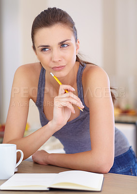 Buy stock photo Coffee, thinking and writing in a journal with a woman in the kitchen of her home in the morning. Relax, idea and diary book with a young person planning the day in her apartment on the weekend