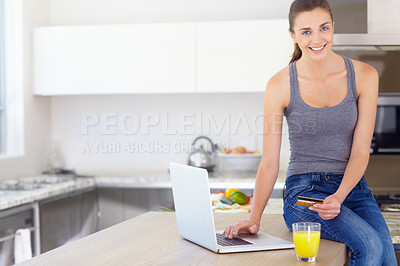 Buy stock photo Portrait, credit card and laptop for online shopping with a woman in kitchen with orange juice in her home. Computer, smile or ecommerce with a happy young person in her apartment for finance payment