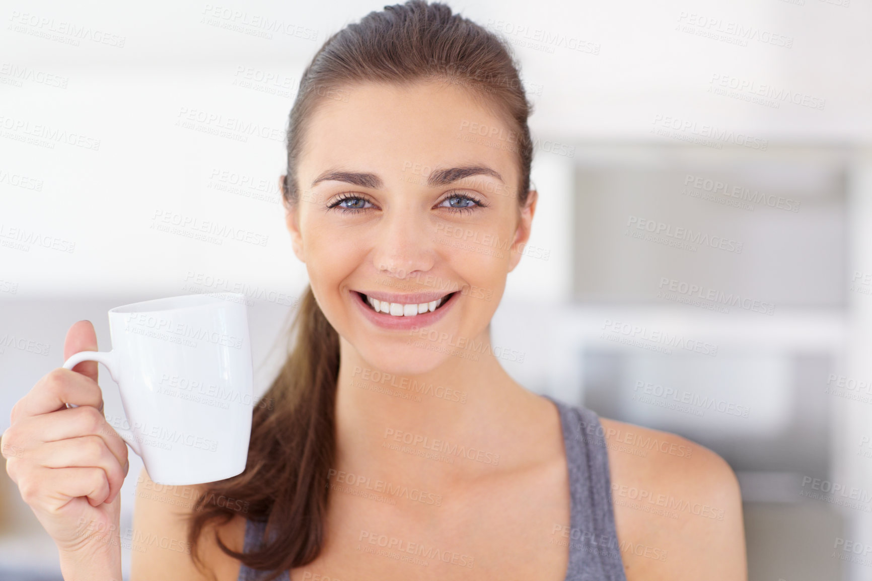 Buy stock photo Portrait, smile and young woman drinking coffee in the kitchen of her home to wake up in the morning. Face, wellness and time off with a happy person in an apartment to enjoy a warm caffeine beverage