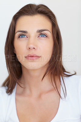 Buy stock photo Woman, beauty and thinking of natural skincare on a white studio background. Vision, face and attractive model with dermatology closeup for future thought on a backdrop with makeup and cosmetics