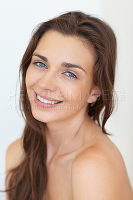 Buy stock photo Portrait, beauty and aesthetic with a young woman in studio on a white background for natural skincare. Face, smile or cosmetics and a happy person looking confident with her antiaging skin routine