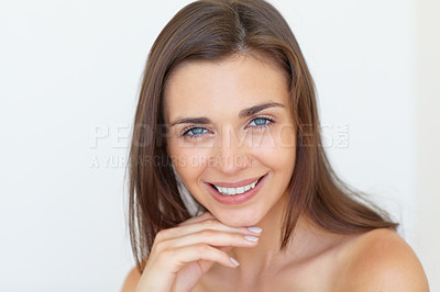 Buy stock photo Portrait, smile and beauty with a young woman in studio on a white background for natural skincare. Face, aesthetic or dermatology and a happy person looking confident with her antiaging skin routine