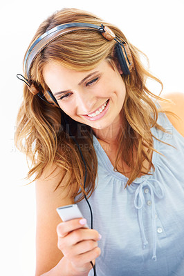 Buy stock photo Woman, headphones and music device in studio for online streaming, listening or radio playlist. Female person, white background and audio hear for album happy or dancing electronics, track for relax