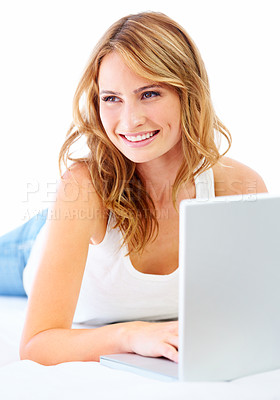 Buy stock photo Woman, laptop and thinking in studio white background for online connection, floor or study email. Female person, model and smile on ground for digital learning or social media, research tech on web