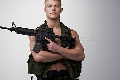 Buy stock photo Soldier man, vest and rifle in studio portrait for military service, fight and fitness by white background. Army agent, government employee and bodybuilder in tactical clothes for battle, war and gun