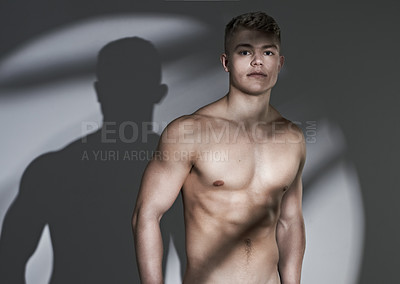 Buy stock photo Man, bodybuilder and muscle in studio portrait, shirtless or confident for wellness by white background. Person, topless model and exercise for healthy body for pride, strong and skin for aesthetic