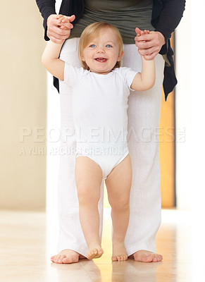 Buy stock photo A cute baby learning to walk