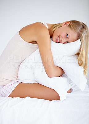 Buy stock photo Person, portrait or hugging bedroom pillow in house for relax, break or weekend rest. Smile, happy or morning woman in pajamas embracing hospitality bedding in hotel, home and comfortable apartment