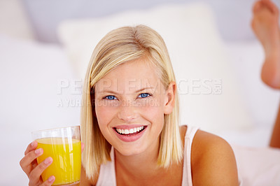 Buy stock photo Portrait, home and woman with orange juice, smile and healthy diet with nutrition, relax and wellness. Face, person and girl with vitamin c, breakfast energy or happiness with drink in glass in house