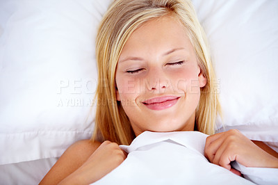 Buy stock photo Women, smile and bed in morning, eyes closed and sleep for day with happiness, positive and joyful. Comfortable, bedroom and relax for healthy rest, pillow and blanket from above, alone and peaceful