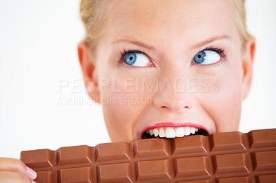 Buy stock photo Studio face, woman thinking or eating chocolate bar, delicious snack or idea for candy food, dessert or sugar product. Diet plan, looking or girl bite, taste or enjoy cacao sweets on white background