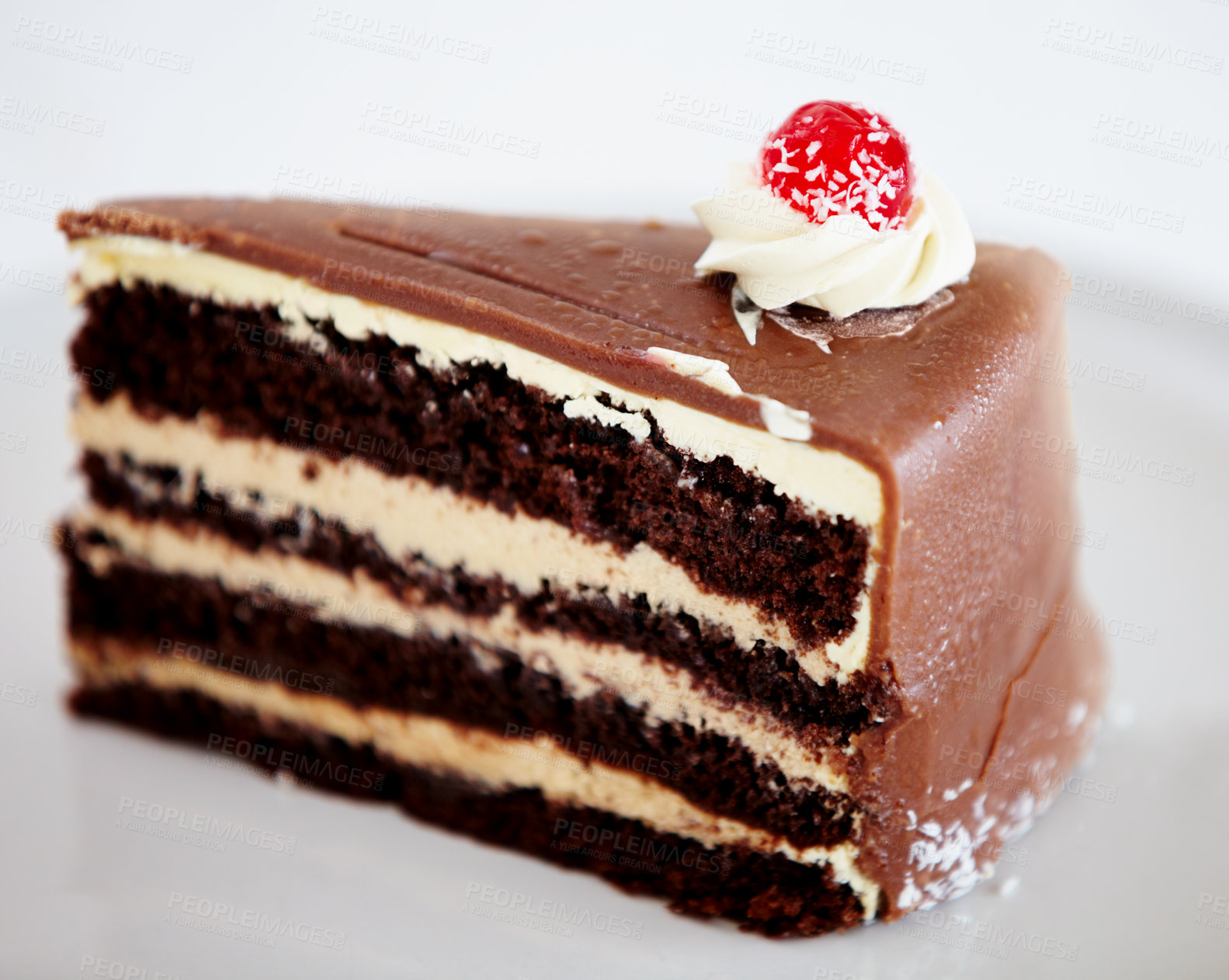 Buy stock photo A slice of delicious chocolate cake on a white plate