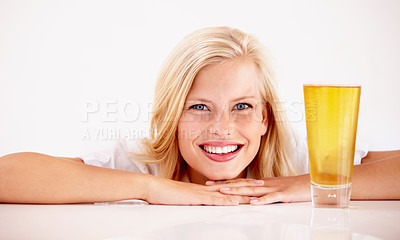 Buy stock photo Woman, portrait and smile with beer drink in studio for weekend relax, summer beverage on white background. Female person, face and model or alcohol glass as pint enjoyment, cider ale or mockup space