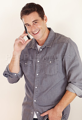 Buy stock photo Man, portrait and phone call in studio for contact, social networking and hello to mobile communication on white background. Happy guy talking on smartphone for chat, conversation or digital feedback