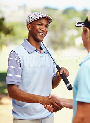 Buy stock photo Sports, golf and athletes shaking hands on a field for competition, tournament or event. Smile, agreement and professional happy men golfers with handshake for welcome on an outdoor grass course.