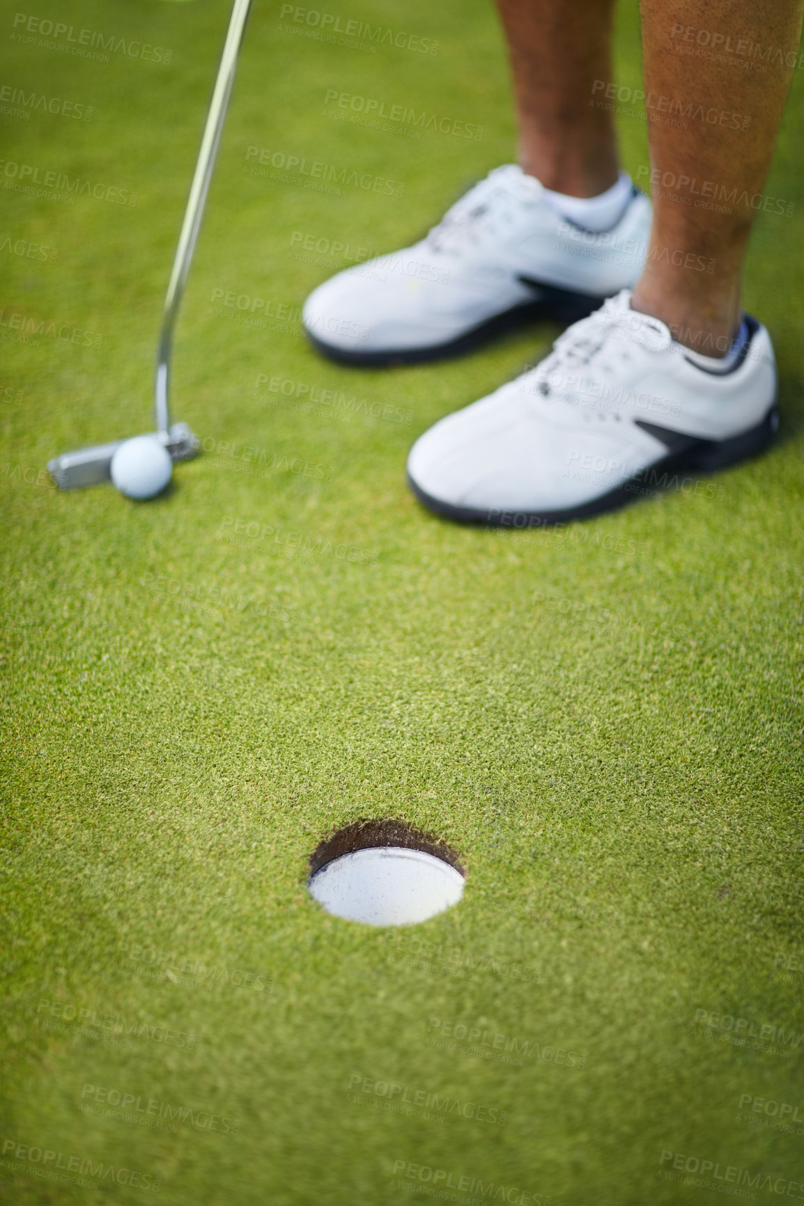 Buy stock photo Sports, golf hole and shoes of golfer on course playing game, practice and training for competition. Recreation, grass and closeup of person by tee, ball and golfing club for winning stroke or score