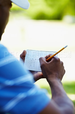 Buy stock photo Sports, golf and person with scorecard on course with sheet for playing game, practice and training. Professional golfer, grass and hands writing score on paper for winning stroke for competition
