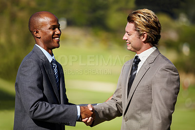 Buy stock photo Happy business men, shaking hands and outdoor for agreement, welcome or teamwork in diversity. Businessman, hand shake and smile in collaboration, deal or excited for partnership meeting or thank you