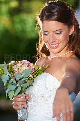 Buy stock photo Happy woman, bride and bouquet of flowers at wedding for marriage, love or commitment at outdoor ceremony. Married female person smile with floral roses in beauty or dress for celebration in nature