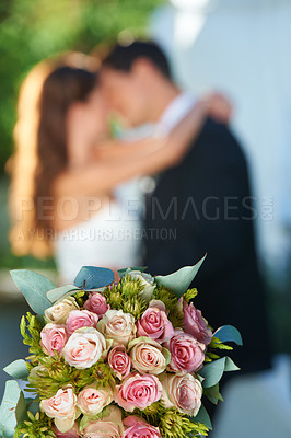 Buy stock photo Bouquet, happy couple and embrace at wedding with love, smile and commitment at reception event. Roses, woman and man hugging at marriage celebration flowers, partnership and future together.