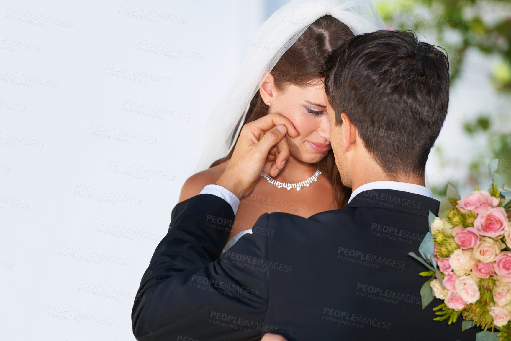 Buy stock photo Wedding, couple hug and woman smile with bride, happy and bouquet outdoor with suit and formal event. Love, commitment and ceremony with celebration, union and bridal dress with roses and loyalty