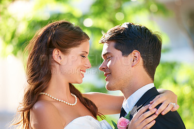 Buy stock photo Happy couple, wedding and hug for love, marriage or affection together in outdoor nature. Married man and woman or newlyweds hugging, smile or support for romantic honeymoon, embrace or commitment