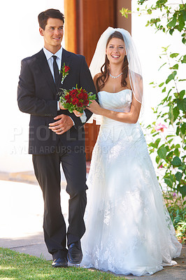 Buy stock photo Happy couple, wedding and holding hands with roses for marriage, love or outdoor commitment together. Married bride and groom walking with smile and bouquet of flowers at bridal event or ceremony