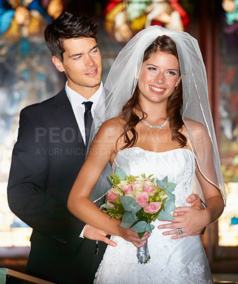 Buy stock photo Happy couple, wedding and smile at church for marriage, love or commitment together at ceremony. Married man and woman with bouquet of roses, flowers and bridal dress for relationship or celebration