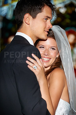 Buy stock photo Shot of a happy newlywed couple embracing in the church with broad smiles