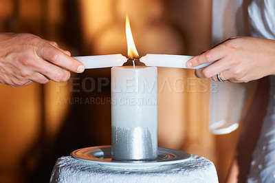 Buy stock photo Couple, hands and candle at wedding for unity, love and commitment at church or ceremony with closeup. Marriage, man and woman with light for trust, relationship and faith with bride and groom